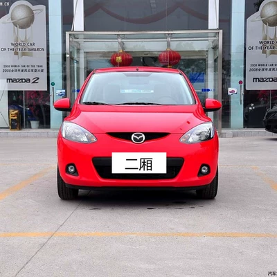 Thích hợp cho Mazda 2 cản trước và cản sau Jinxiang thanh nguyên bản hatchback sedan xe nguyên bản thanh bảo vệ xe lớn bao quanh biểu tượng ô tô đèn bi led gầm ô tô