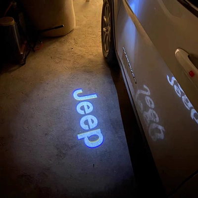 dán nội thất ô tô Jeep jeep miễn phí ánh sáng sửa đổi gương chiếu hậu đèn chào mừng trong nước mới miễn phí ánh sáng chiếu đặc biệt đèn khí quyển logo ô tô decal dán xe ô tô